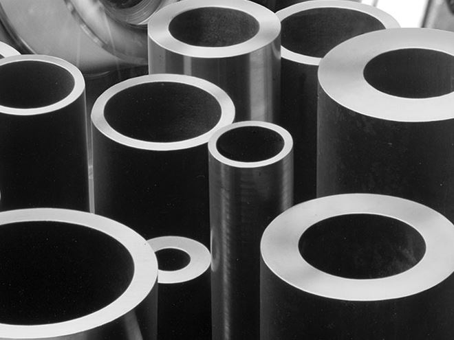 Seamless tubes and hollow bar